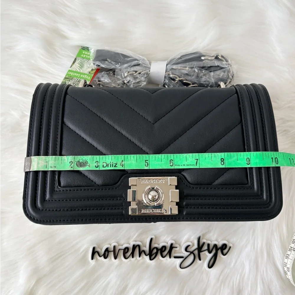Badgley Mischka bag closure stitching